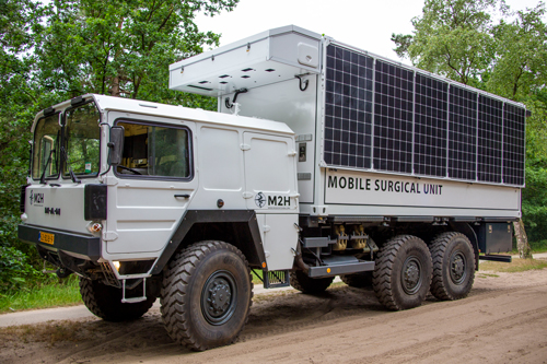 Mobile surgery unit 2 is a big truck with solar panels on the side