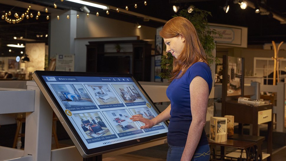 An Elo touchscreen kiosk aids in customer product selection